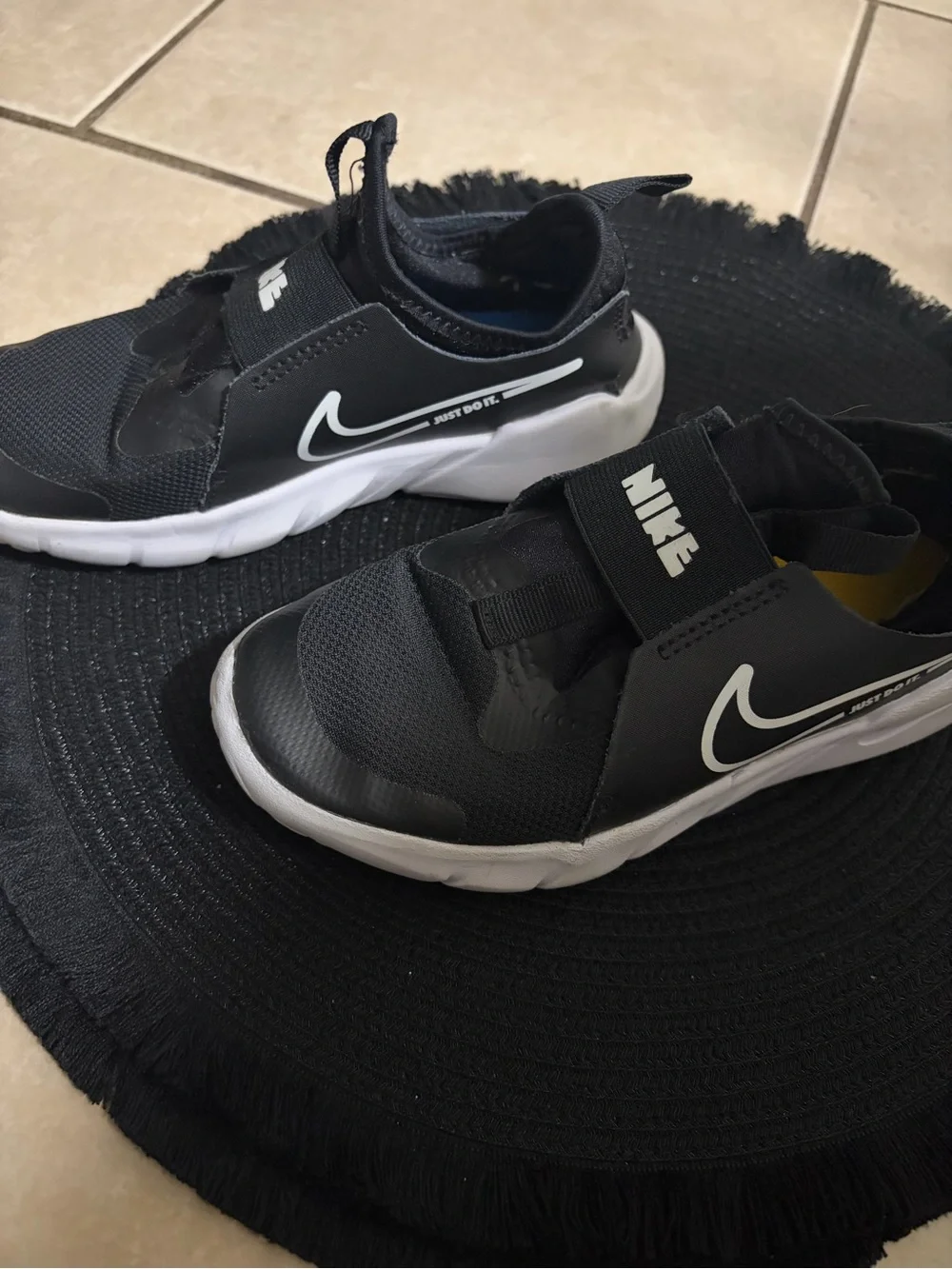 Nike Kids Black and White Slip-On Sneaker with Swoosh